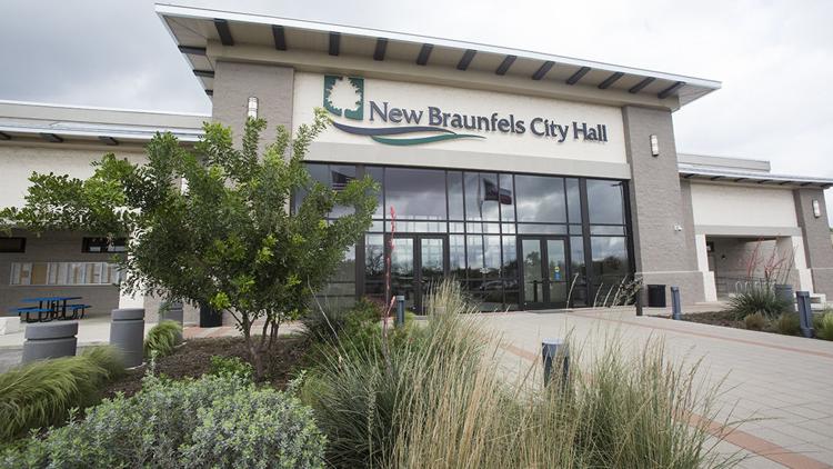 The entrance to the new New Brunswick city hall, surrounded by parks, trails, and Mayfair homes.