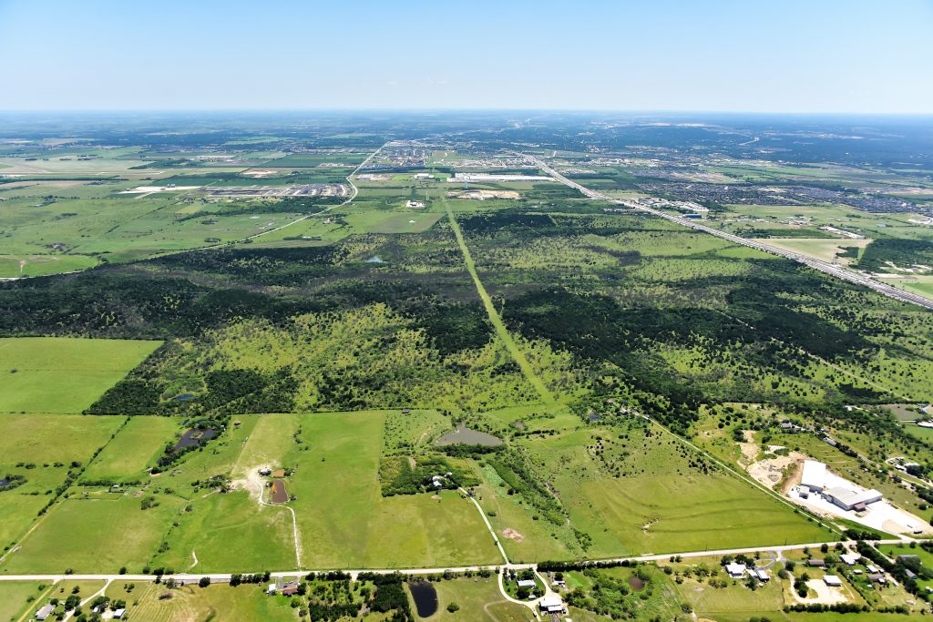 An aerial view of parks, trails, and homes in New Braunfels.