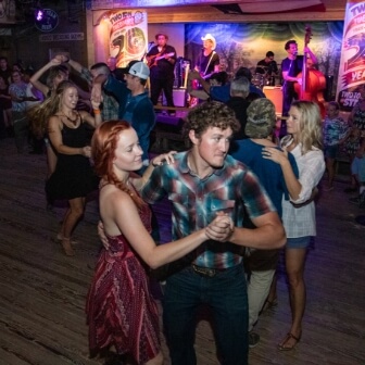 A group of people dancing in New Braunfels.